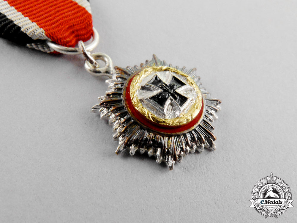 germany,_republic._a_miniature_german_cross_in_gold,1957_version_m17-3054