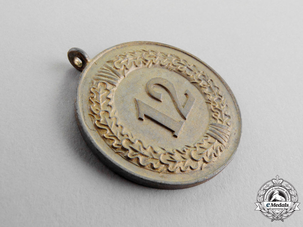 germany._a_second_war_period_wehrmacht_heer(_army)12_year_long_service_medal_m17-403_1_1