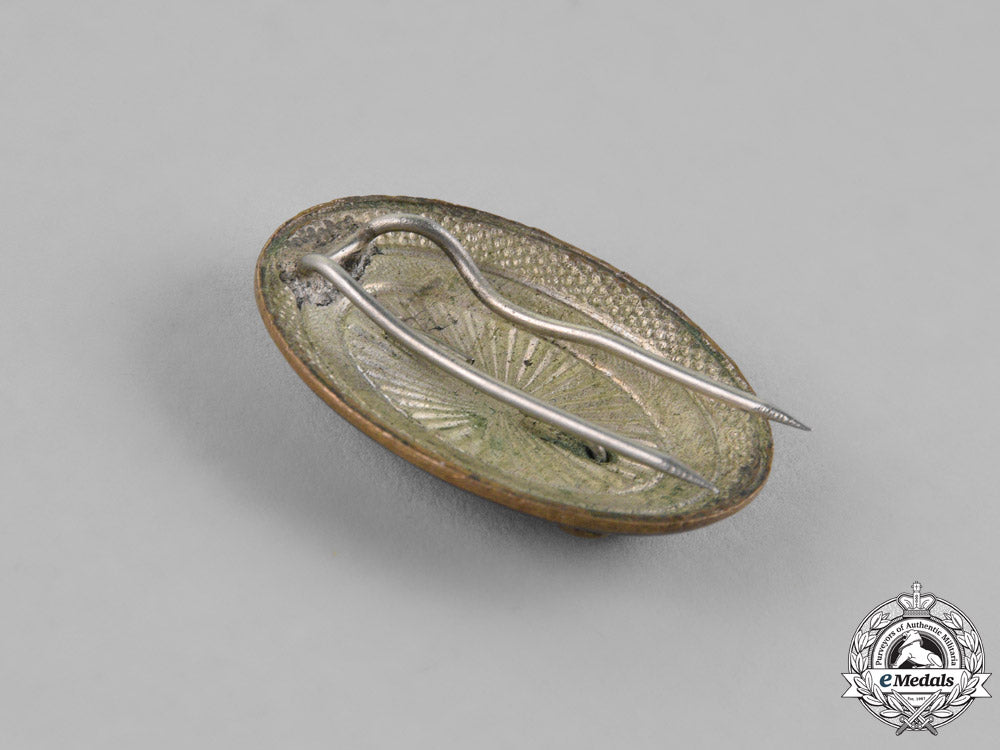 yugoslavia,_kingdom._an_army_officer's_cap_badge,_c.1940_m18-2329