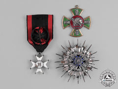 International. A Lot Of Three Badges & Insignia