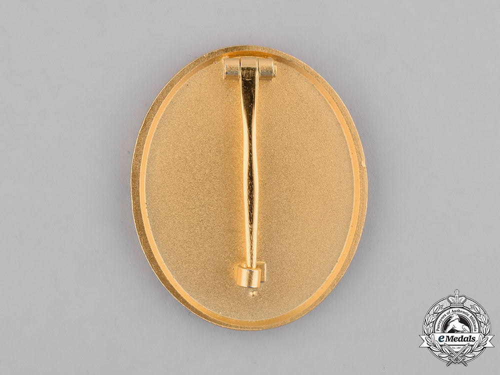 germany,_wehrmacht._a_second_war_wound_badge_with_stick_pin,_gold_grade,1957_reissue_m181_5442