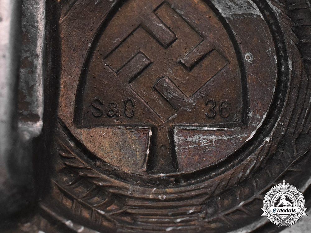 germany,_rad._a_standard_issue_em/_nco’s_rad_belt_buckle,_with_leather_tab,_by_schmöle&_co_m181_5514