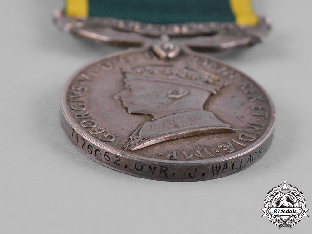 united_kingdom._an_efficiency_medal_with_territorial_scroll,_royal_artillery_m182_0972