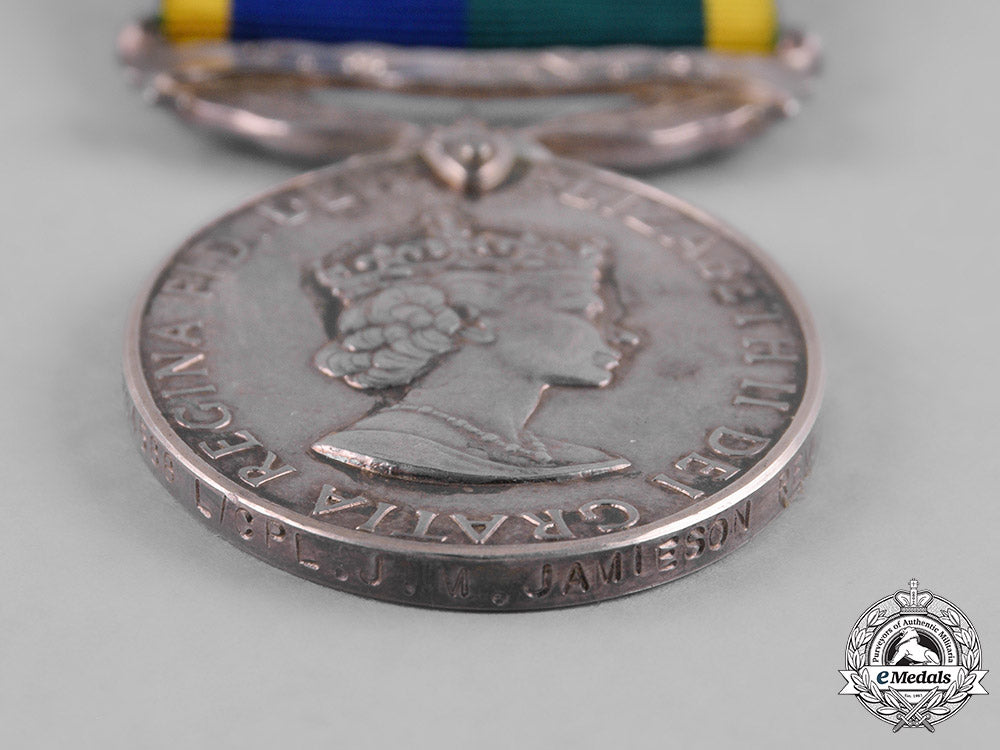 united_kingdom._an_efficiency_medal_with_territorial_and_army_volunteer_reserve_scroll,_reme_m182_0981