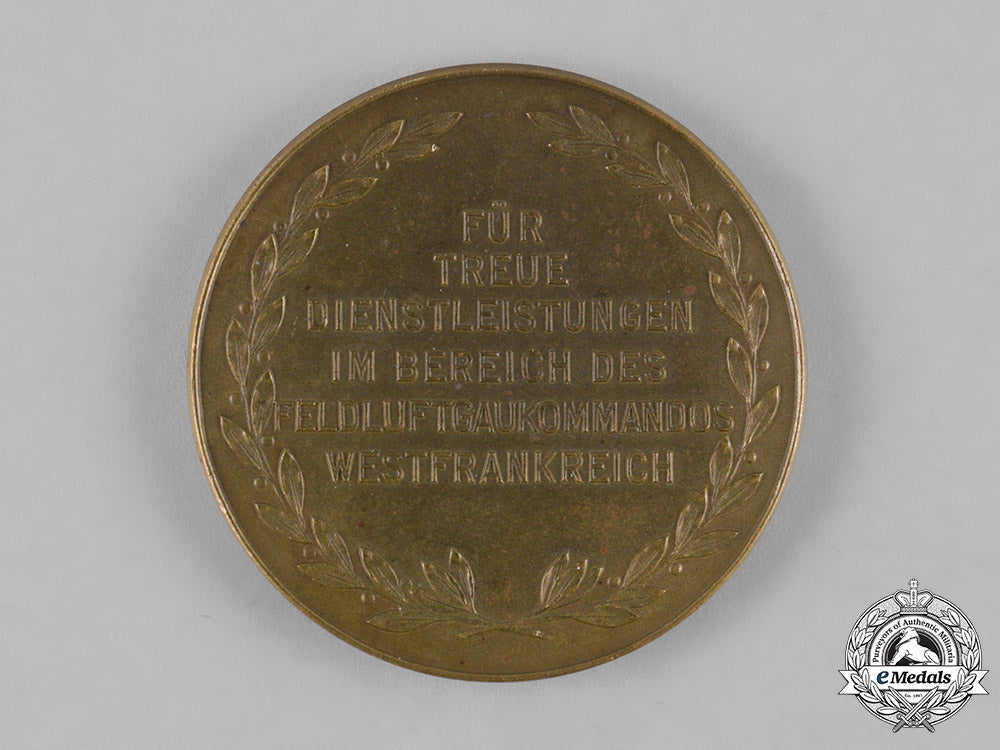 germany,_luftwaffe._a_luftwaffe_western_france_loyal_service_medallion_in_case_m182_4104_1_1