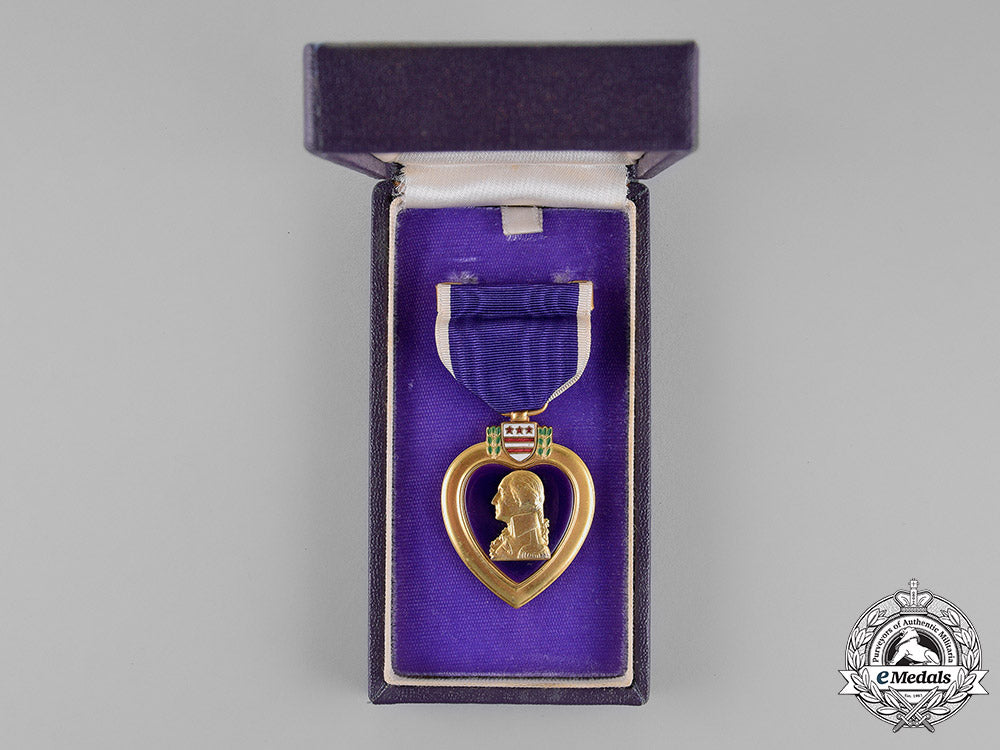 united_states._a_purple_heart_to_corporal_strug,1_st_marine_division,_battle_of_cape_gloucester,_wia,1943_m18_4288
