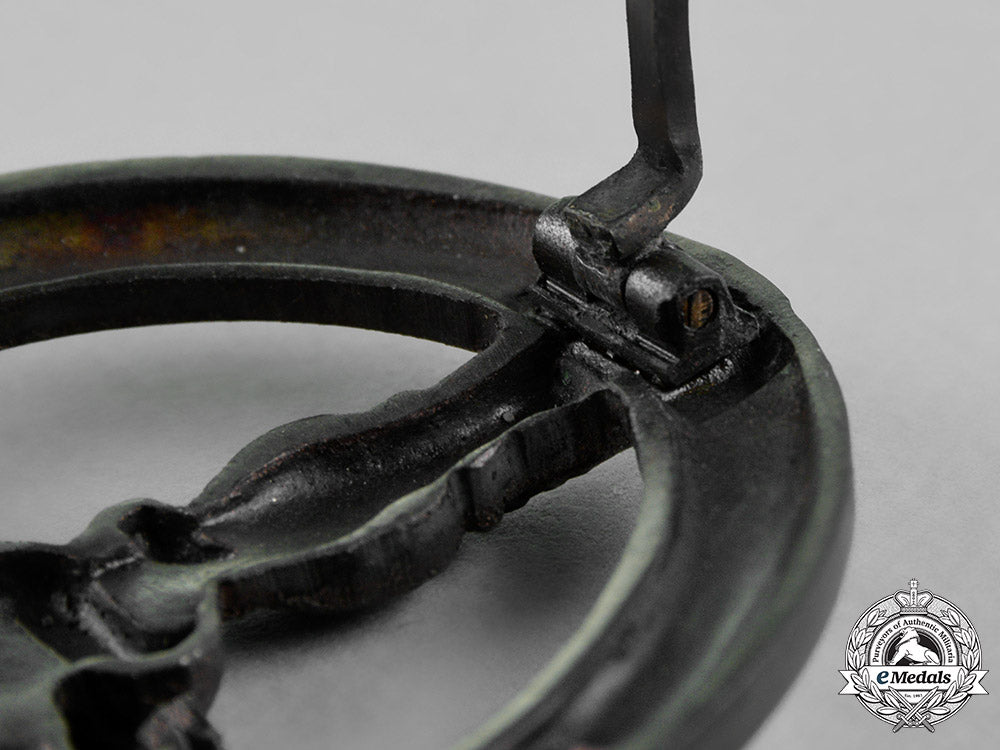 germany._an_anti-_partisan_guerrila_warfare_badge,_in_bronze,_by_c._e._juncker_m18_4959