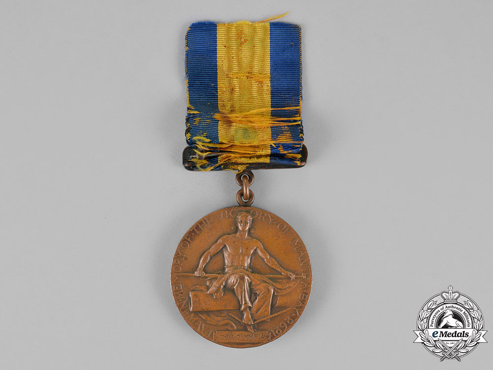 united_states._a_tiffany-_made_manila_bay_medal(_dewey_medal)_to_apprentice_i_class_kelley,_uss_olympia,_usn_m18_7478