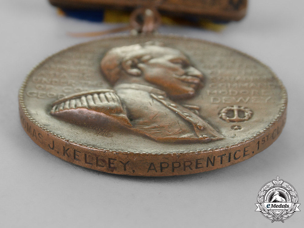 united_states._a_tiffany-_made_manila_bay_medal(_dewey_medal)_to_apprentice_i_class_kelley,_uss_olympia,_usn_m18_7483