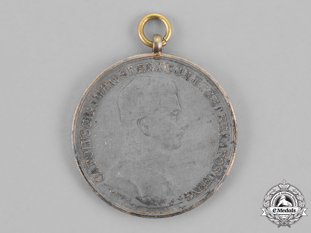 austria,_empire._a_grouping_of_four_bravery_and_merit_medals_m18_8339