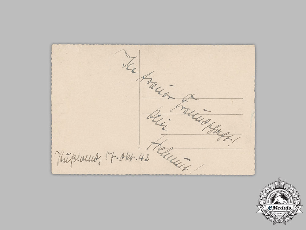 germany,_heer._a_studio_portrait_of_a_panzer_nco_with_dedication_from_russia,1942_m19_1411_1_1_1_1