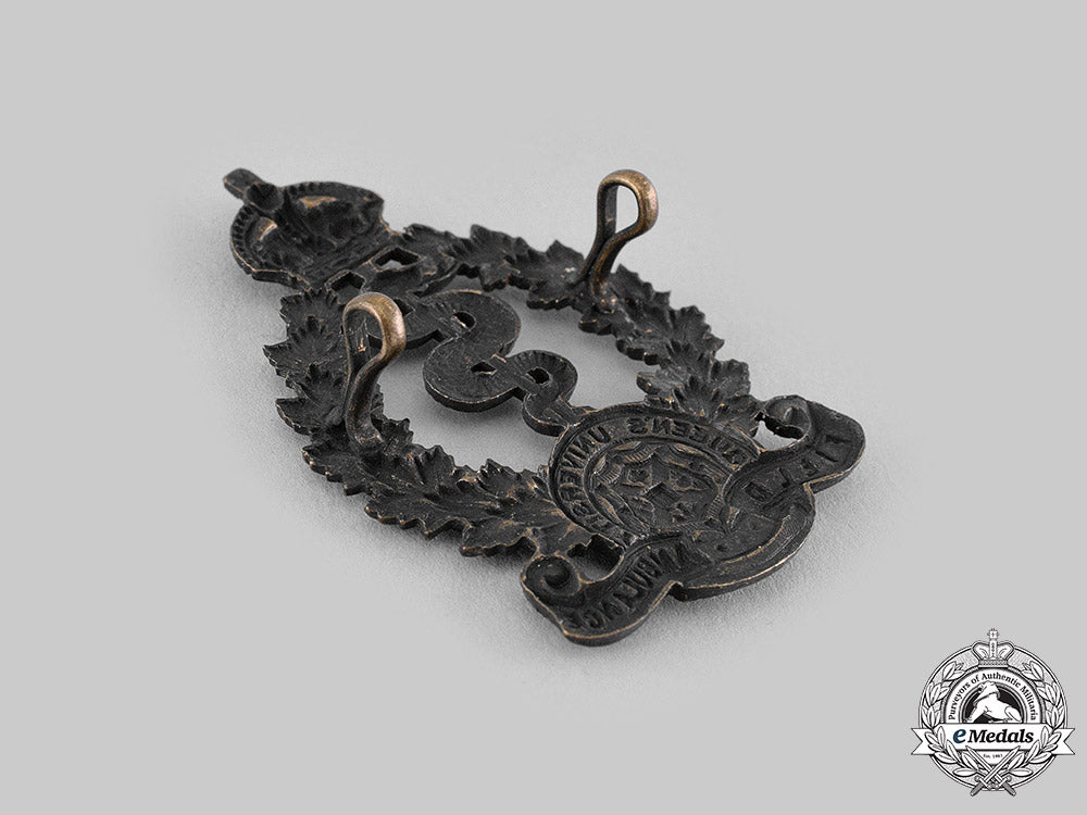 canada,_cef._a2_nd_canadian"_queen's_university"_field_ambulance_cap_badge,_c.1915_m19_17675