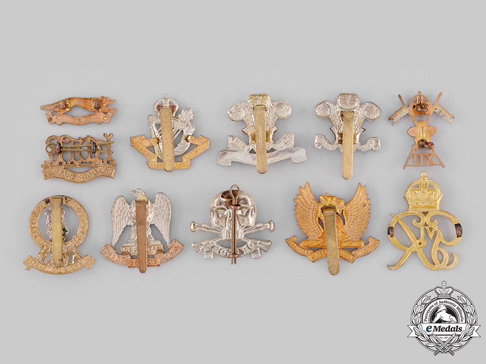 united_kingdom._a_lot_of_eleven_regimental_badges_m19_19207