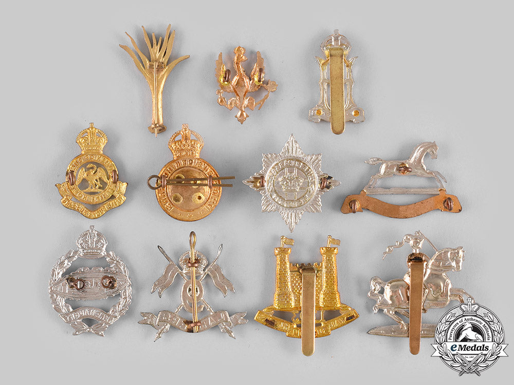 united_kingdom._a_lot_of_eleven_regiment_badges(_collectors_copies)_m19_20828