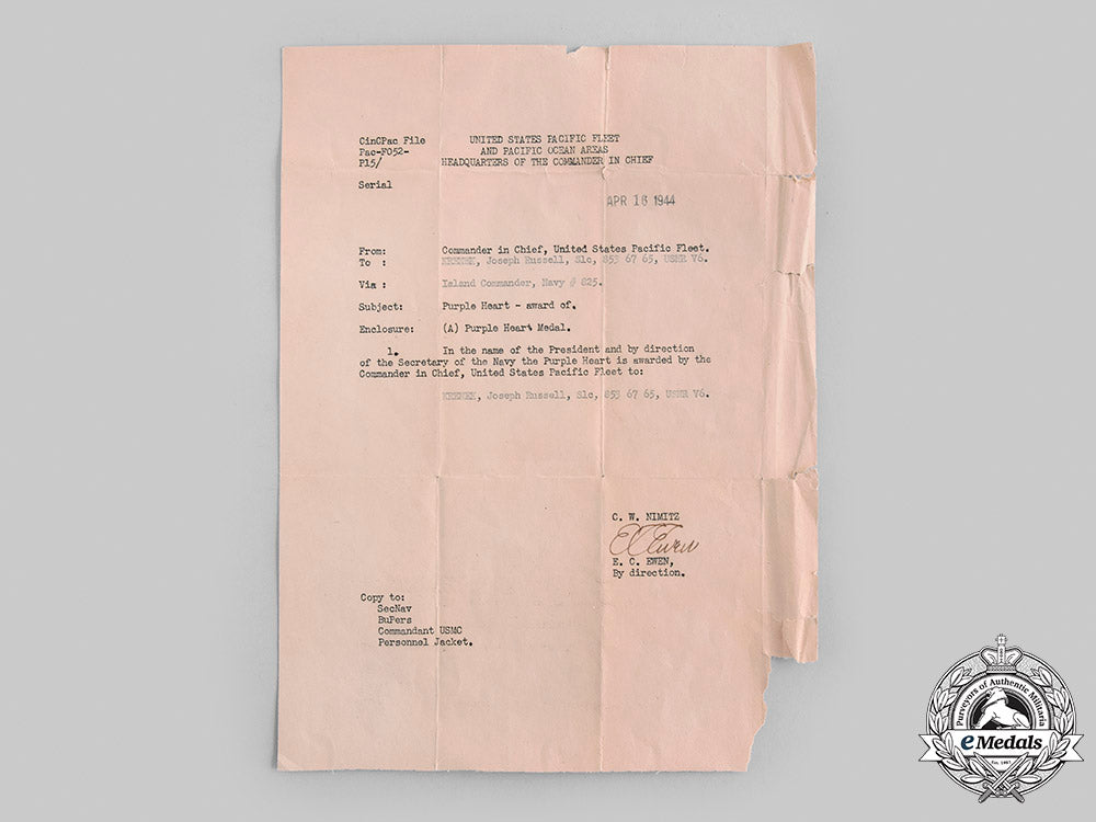 united_states._a_purple_heart_to_seaman_krenek,_wounded_during_roi_island_attack,_february12,1944_m19_23108