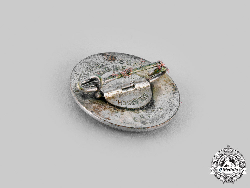 germany,_nsdap._a_membership_badge,_by_deschler&_sohn_m19_24016
