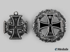 Germany Imperial. A Pair Of 1914 Iron Cross Badges