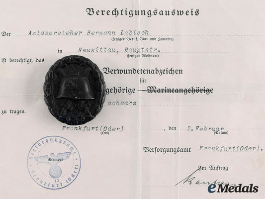 germany,_third_reich._a_wound_badge_and_document_to_hermann_labisch_m19_26555_1