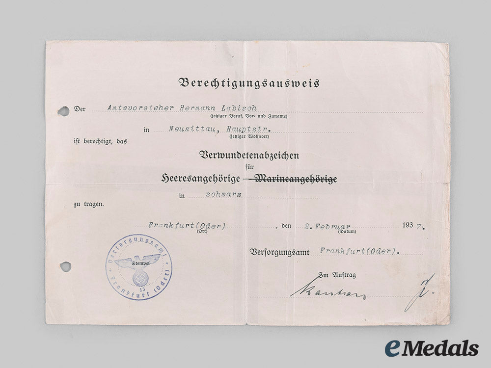 germany,_third_reich._a_wound_badge_and_document_to_hermann_labisch_m19_26559_1