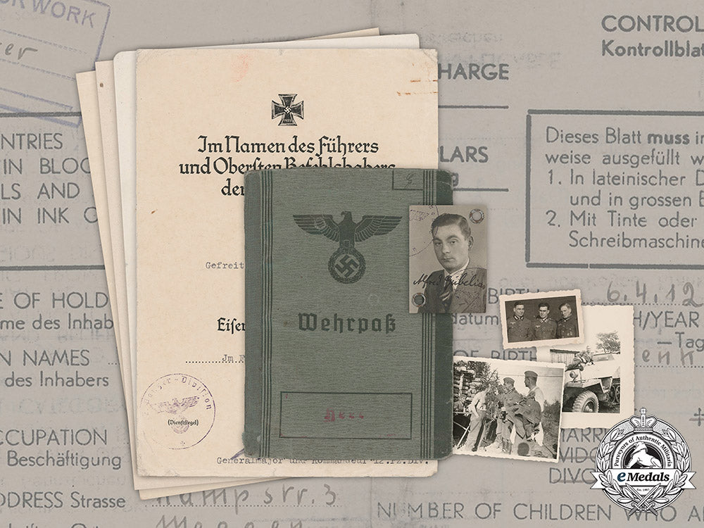 germany,_heer._a_wehrpaß,_award_documents,_and_photographs_to_driver_staff_corporal_alfred_gubelius_m19_6036