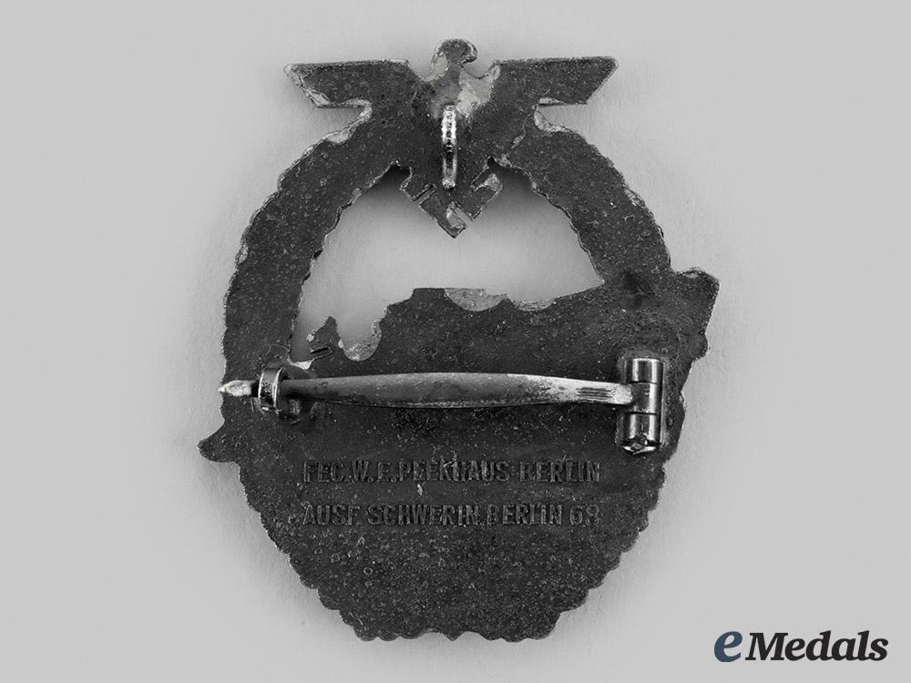 germany,_kriegsmarine._an_e-_boat_war_badge,_i_i_pattern,_by_schwerin_m20_00715_2_1_1_1