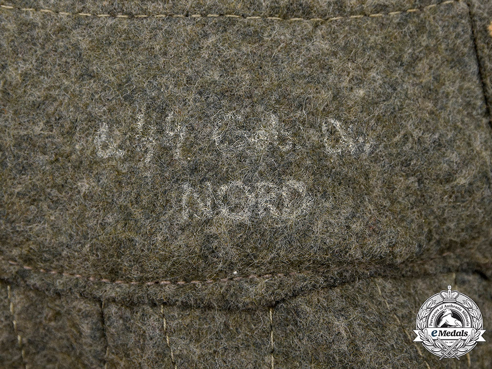 germany,_ss._a_removable_greatcoat_hood,6_th_ss_mountain_division_nord,_by_r.&_a._becker_m20_1910_mnc6385_1