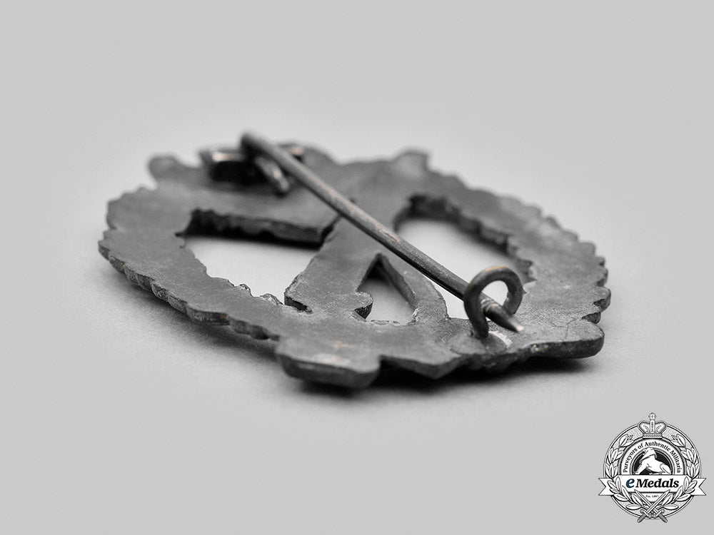 germany,_wehrmacht._a_pair_of_service_badges_m20_2494_mnc2802_2