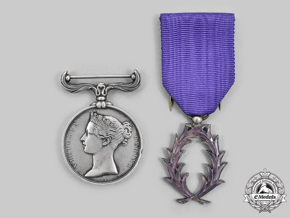 united_kingdom._a_lot_containing_a_crimea_medal,_french_order_of_academic_palms,_knight_and_royal_victorian_order_case_m20_682_mnc7975_1