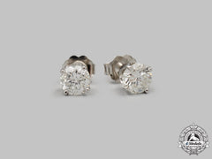 Jewellery. A Pair Of White Gold Round Brilliant Cut Diamond Stud Earrings
