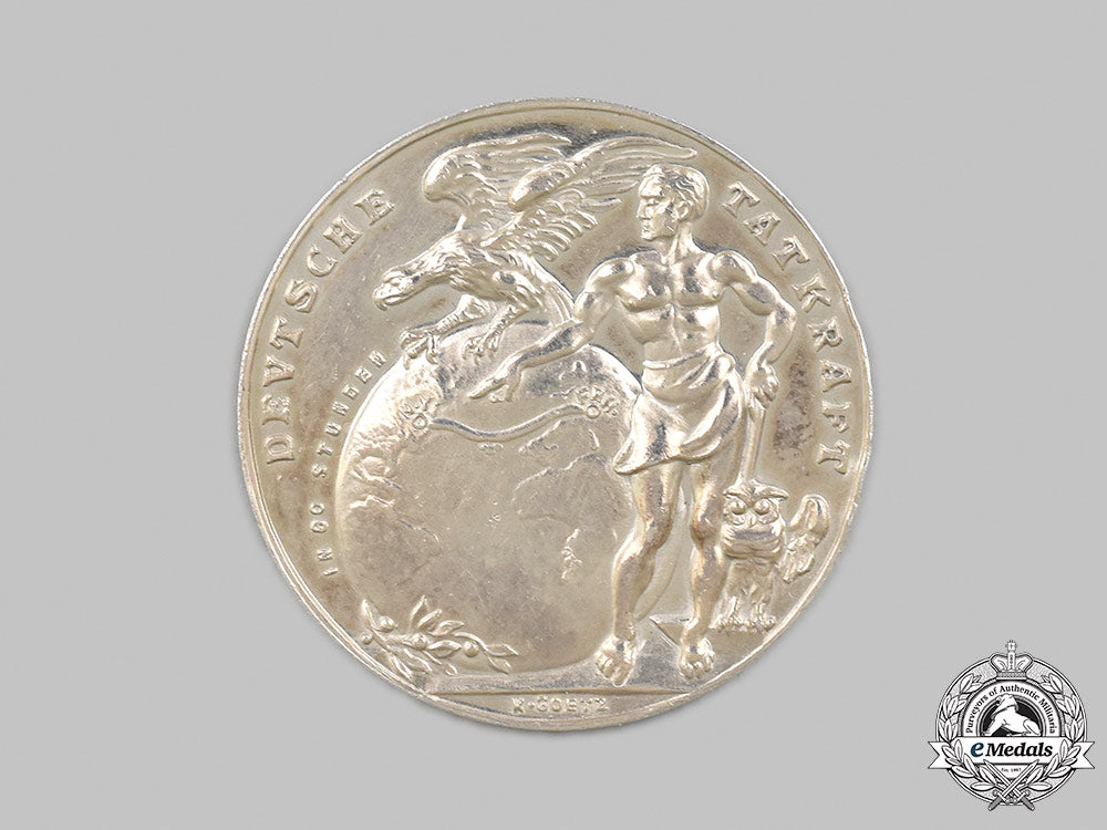 germany,_weimar_republic._a1924_zeppelin_trans-_atlantic_flight_commemorative_silver_medallion,_by_karl_goetz_m21_mnc5159_1_1_1