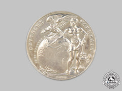 Germany, Weimar Republic. A 1924 Zeppelin Trans-Atlantic Flight Commemorative Silver Medallion, By Karl Goetz