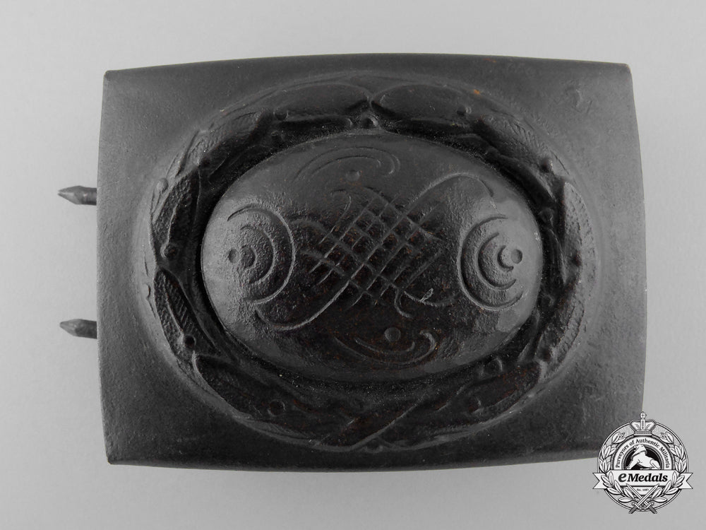 a_probable_post-_war_modification_of_a_luftwaffe_enlisted_man's_belt_buckle;_published_m_063