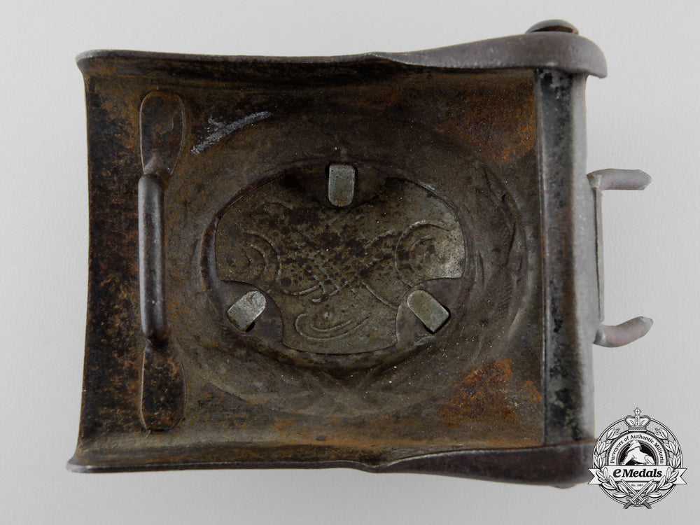 a_probable_post-_war_modification_of_a_luftwaffe_enlisted_man's_belt_buckle;_published_m_064