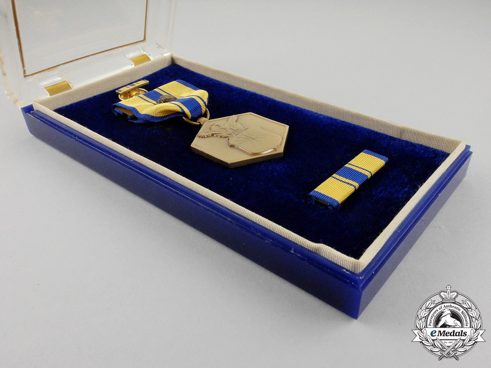 united_states._an_air_force_commendation_medal_with_oak_leaf_cluster,_cased,_to_alton_o._eckhardt_m_094_1