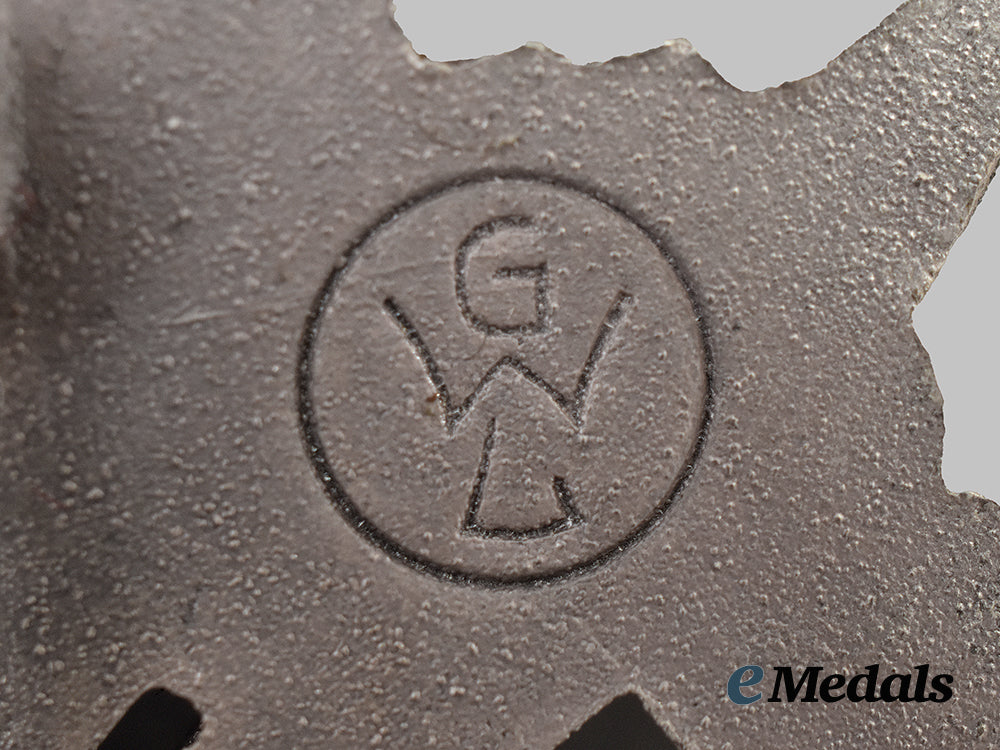 germany,_wehrmacht._a_mint_infantry_assault_badge,_silver_grade,_by_gebrüder_wegerhoff__mnc6560