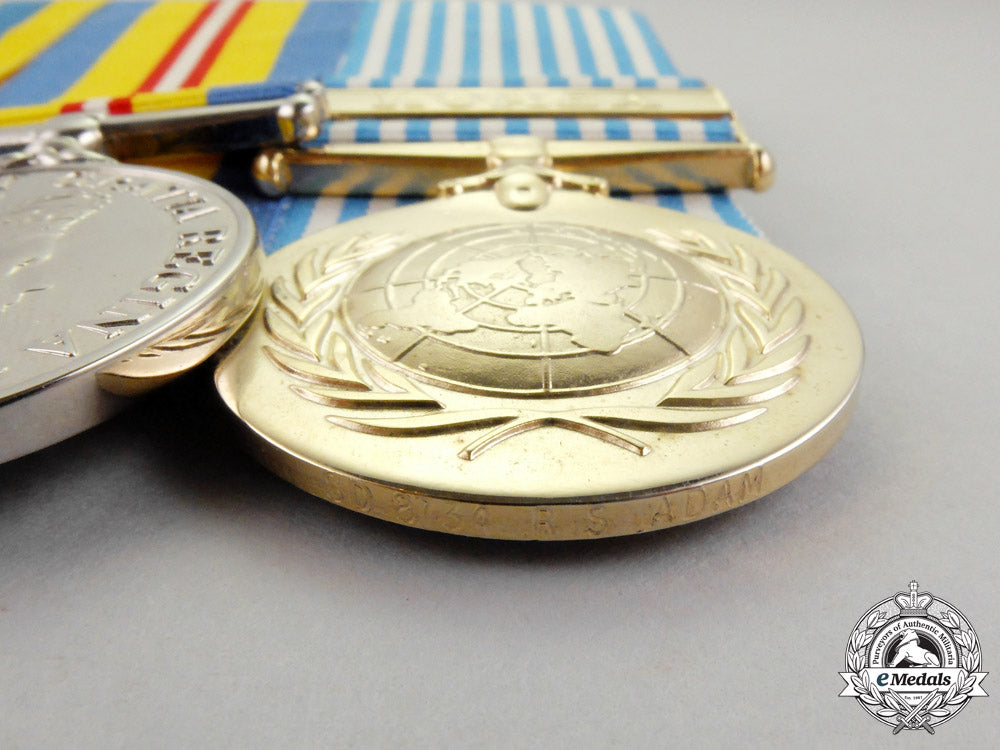 canada._a_korean_war_veteran's_group_of_three_to_r.s._adam_o_731_1