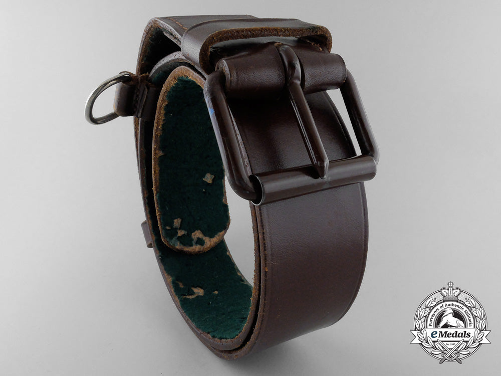 a_brown_forestry_belt_with_single_open_claw_buckle_o_929_1