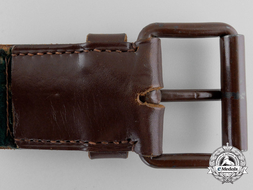 a_brown_forestry_belt_with_single_open_claw_buckle_o_931_1