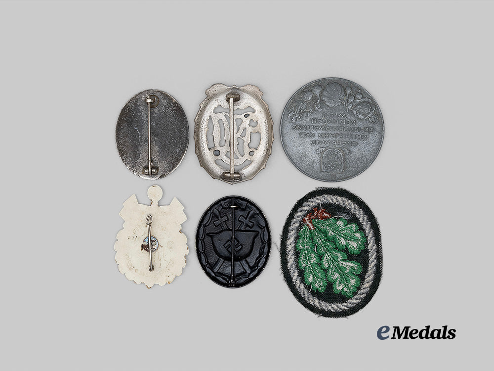 germany,_third_reich._a_mixed_lot_of_badges_for_military_and_paramilitary_personnel_e_medals__g62850_3