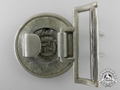 an_early&_rare_ss-_officer’s_belt_buckle_in_nickel-_silver_by_overhoff&_cie;_published_example_p_084