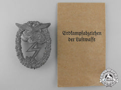 A Luftwaffe Ground Assault Badge With Packet Of Issue
