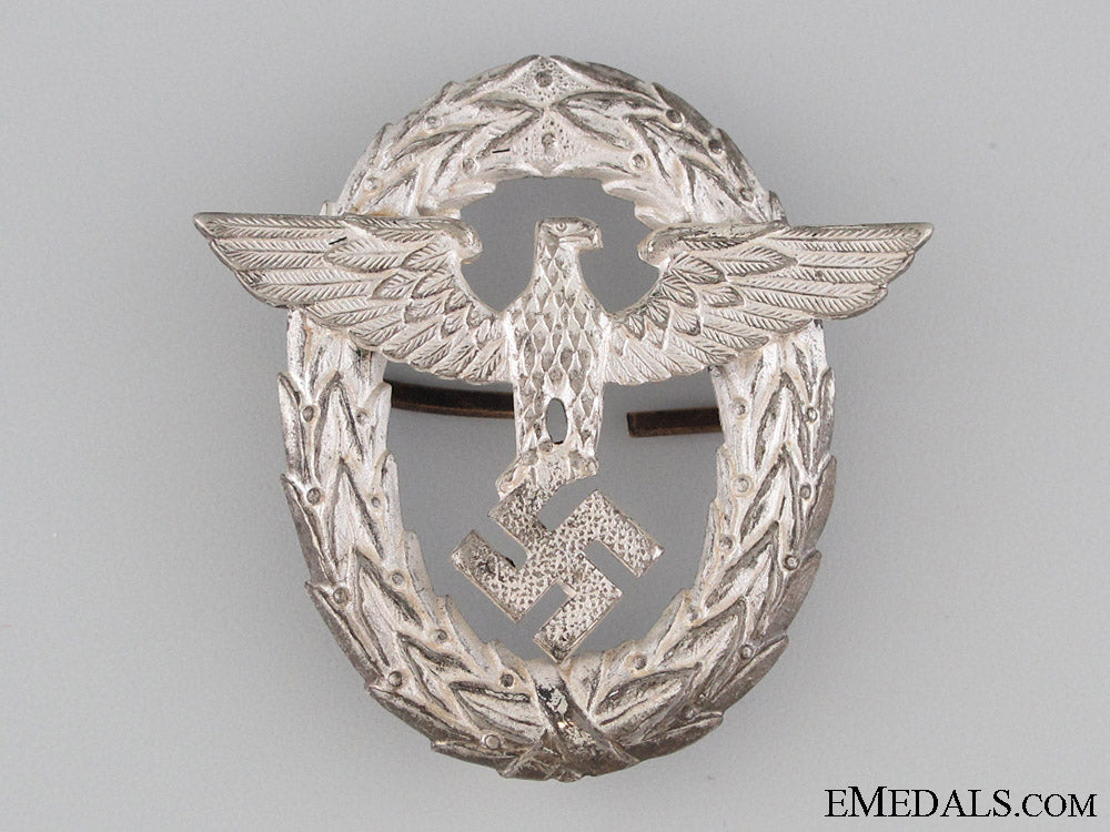 police_officer's_visor_cap_insignia-1_st_pattern_police_officer_s_52aa225ec8d1c