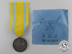 A Saxon Friedrich August Medal; Silver Grade With Packet