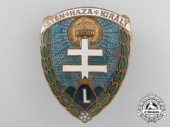 A Hungarian Levente Movement Cap Badge