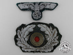 A German Army Officer Visor Wreath And Eagle Insignia