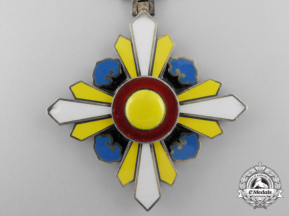 manchukuo._japanese_occupation._an_order_of_the_auspicious_clouds,3_rd_class_badge_s_467