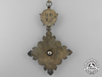 manchukuo._japanese_occupation._an_order_of_the_auspicious_clouds,3_rd_class_badge_s_469