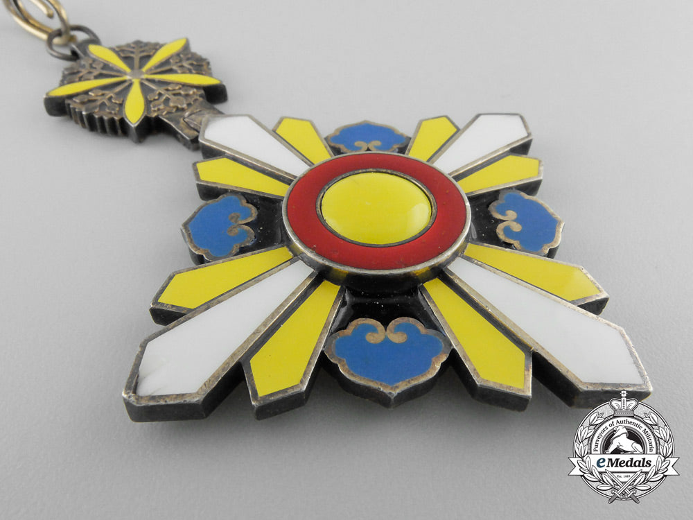 manchukuo._japanese_occupation._an_order_of_the_auspicious_clouds,3_rd_class_badge_s_470