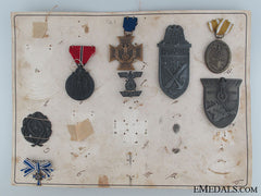 A Salesman’s Board With Eight Awards