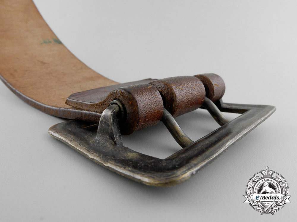 a_double_open-_claw_buckle_with_brown_belt_t_904